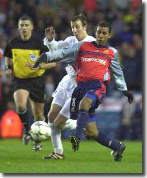 Lee Bowyer battles for the ball in midfield
