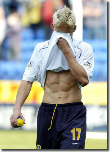 Alan Smith hides his tears as Leeds United are relegated following defeat at Bolton