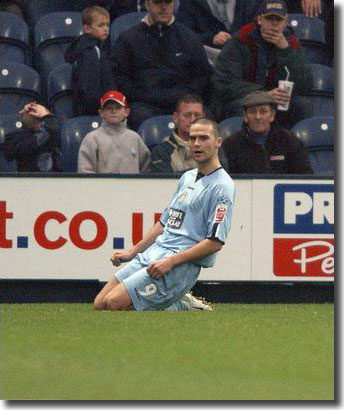 David Healy celebrates his second goal in the 4-2 victory at Preston North End