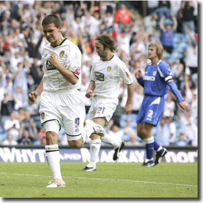 David Healy celebrates his cool penalty winner in United's opener against Millwall