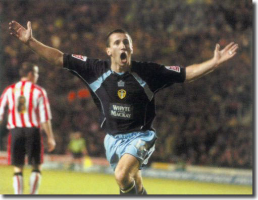 Liam Miller celebrates his late winner at St Mary's to settle an incredible match