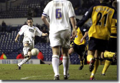 Gary Kelly fires in an unstoppable shot to take the game with Wigan into penalties