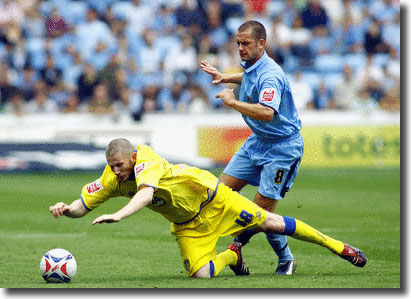 Kevin Nicholls is tackled by Coventry's Michael Doyle during the defeat in September