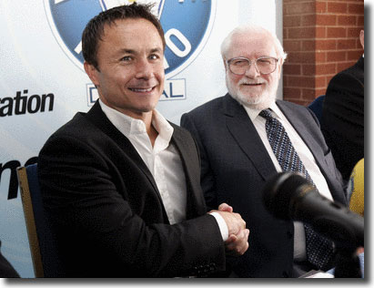 Dennis Wise shakes hands with Ken Bates during the introductory press conference on October 26