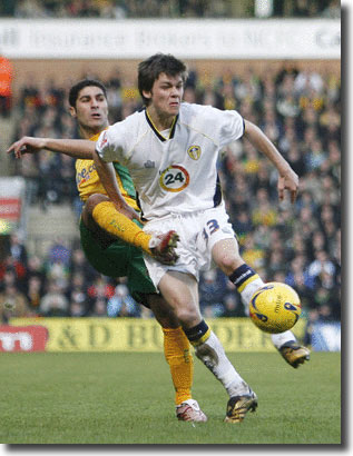 Norwich City's Youssef Safri tackles 18-year-old starlet Jonathan Howson on 3 February