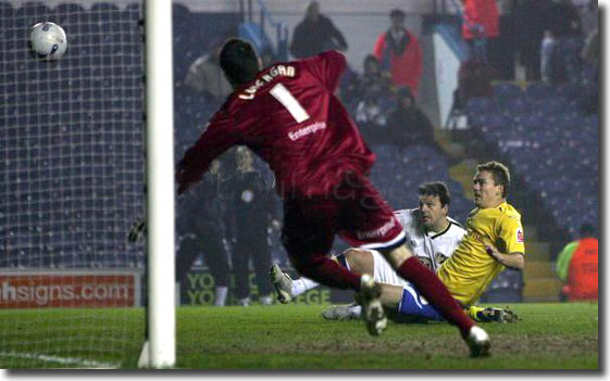 Robbie Blake slides in to equalise against Preston on 30 March