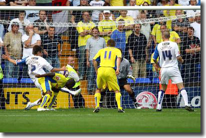 Tresor Kandol bends to nod home a late winner at Tranmere on the opening day