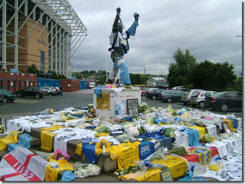 The statue of Billy Bremner bedecked with flowers, shirts and messages of support - July 2007