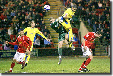 Jermaine Beckford leaps to beat the Crewe keeper and score the only goal at Gresty Road on 14 January