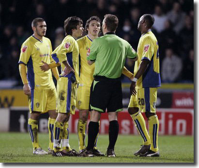 Jonathan Douglas is about to be dismissed at Huddersfield on 15 April as Johnson, Howson and Kandol protest