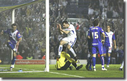 Dougie Freedman celebrates scoring a dramatic late goal against Carlisle in the first leg at Elland Road