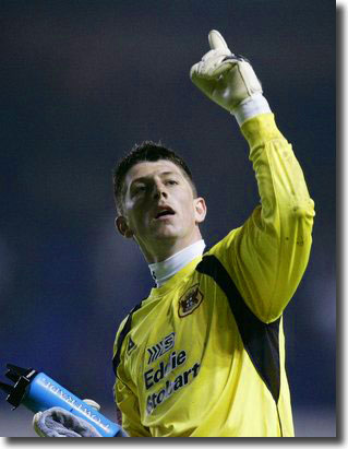 Carlisle keeper Keiren Westwood salutes the Elland Road crowd following an outstanding performance in the first leg