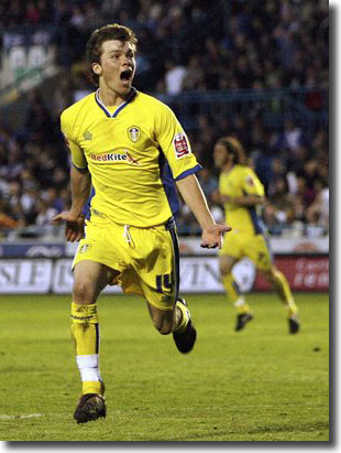 Jonathan Howson celebrates scoring the second goal at Carlisle which took United to Wembley