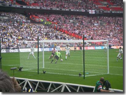 Ankergren about to make the first of a number of early saves against Doncaster, denying James Hayter