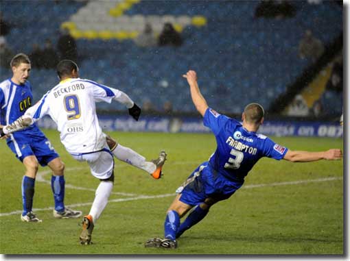 Jermaine Beckford curls in a beauty to give United the lead against Millwall on 9 February