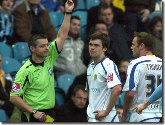 Lee Trundle looks on as Jonny Howson is sent off against Scunthorpe on 28 February