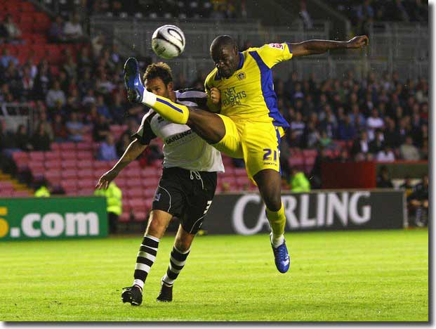 Enoch Showunmi athletically reaches for the ball at Darlington before flicking home the only goal with the very tip of his boot. It was a welcome return for the giant striker after his career was called into question by the discovery of a blood clot near his lung