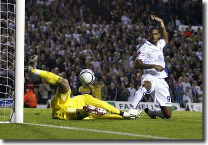 Jermaine Beckford beats the keeper to the ball, but the goal is chalked off