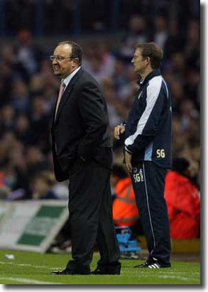 Liverpool manager Rafa Benitez and United boss Simon Grayson during the match