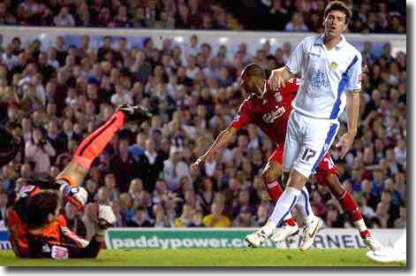 David Ngog turns away after scoring at Elland Road with Higgs and Michalik showing their disappointment