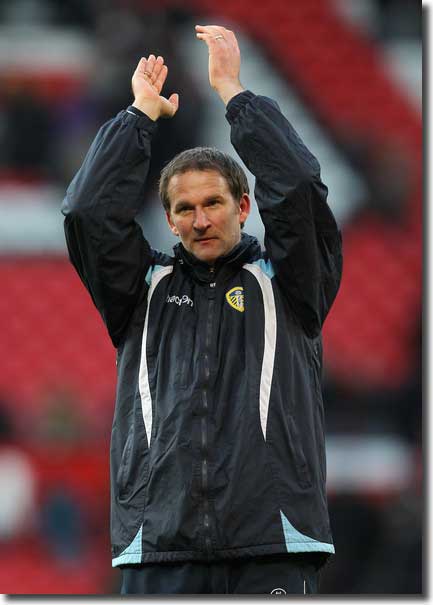 Simon Grayson applauds the fans at the end