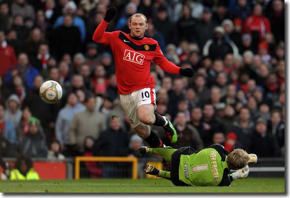 Wayne Rooney hurdles Casper Ankergren to send the ball goalwards only for Jason Crowe to clear it off the line