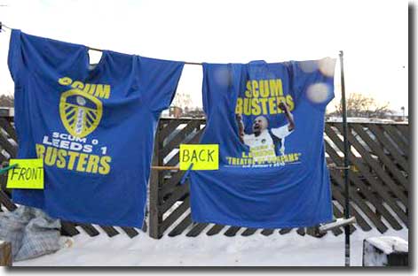 'Scum Busters' T shirts commemorating the Old Trafford victory on sale at Elland Road before the game with Wycombe