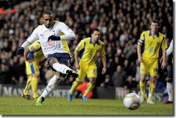 Spurs' Jermaine Defoe sends in his penalty only to see Casper Ankergren pull off a save