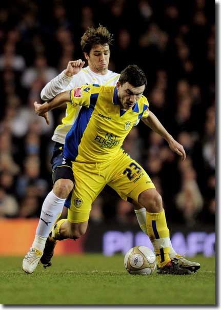 Robert Snodgrass holds off the challenge of Niko Kranjcar