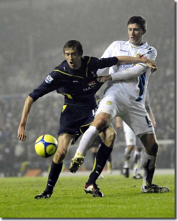 Battle of the Giants! Peter Crouch and Lubo Michalik tangle at Elland Road. The England striker had the best of the contest, dominating in the air