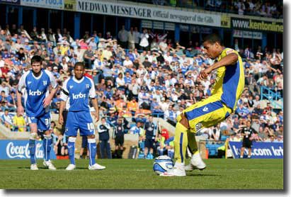 Jermaine Beckford gets United's second at Gillingham from the penalty spot