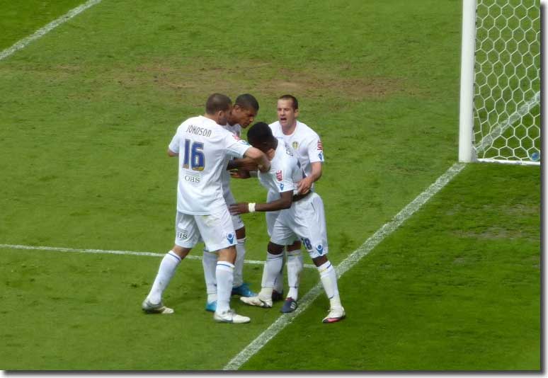 Max Gradel tries to confront the referee after being ordered off but wisely Johnson, Beckford and Doyle intervene