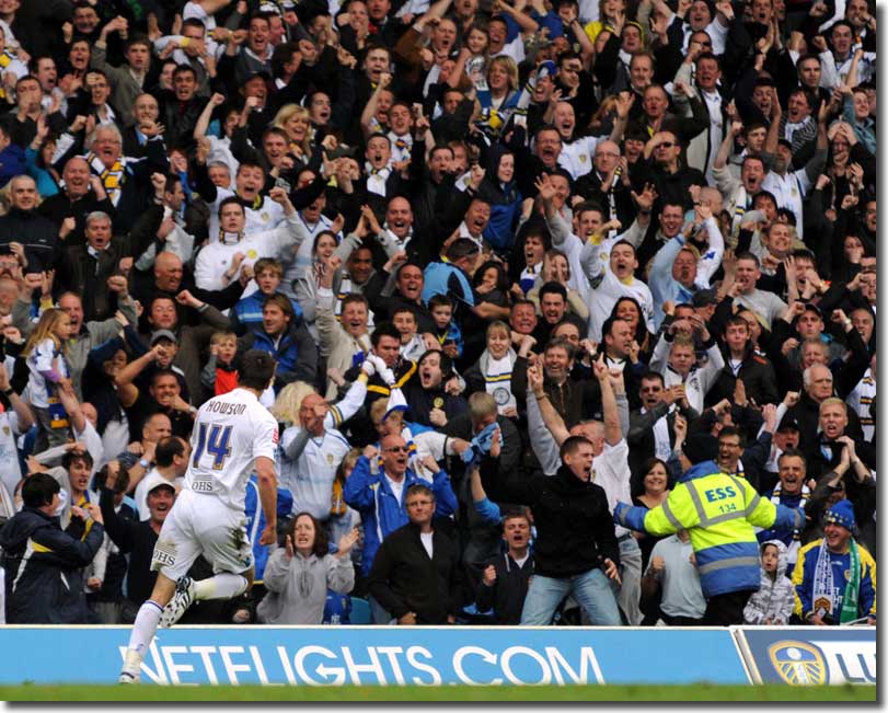 Jonny Howson celebrates with the fans after a memorable equaliser