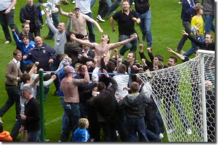 Andy Hughes in triumphant celebration with the United fans