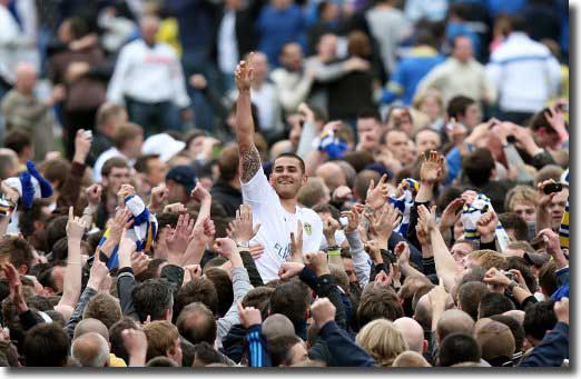 Bradley Johnson joins in the fans' promotion party