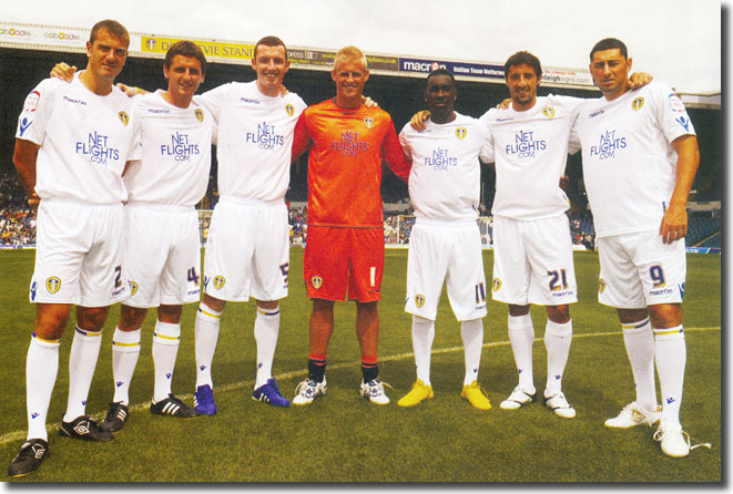 United's new men - Paul Connolly, Alex Bruce, Neill Collins, Kasper Schmeichel, Lloyd Sam, Fede Bessone and Billy Paynter line up for the cameras