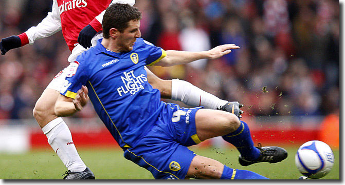 Centre-back Alex Bruce, pictured tackling Arsenal's Andrey Arshavin, was in outstanding form at the Emirates on 8 January