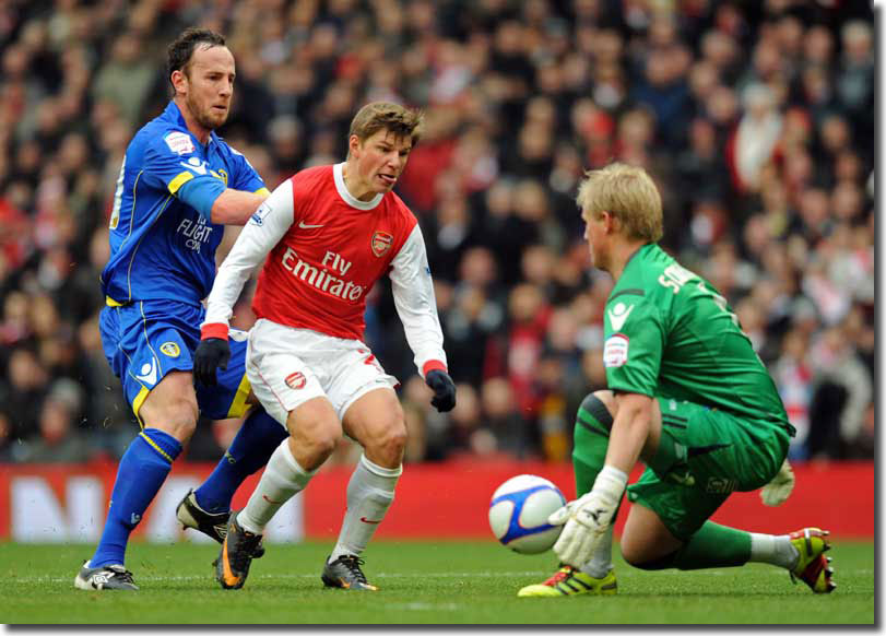 Kasper Schmeichel denies Andrei Arshavin in the first clear chance of the contest