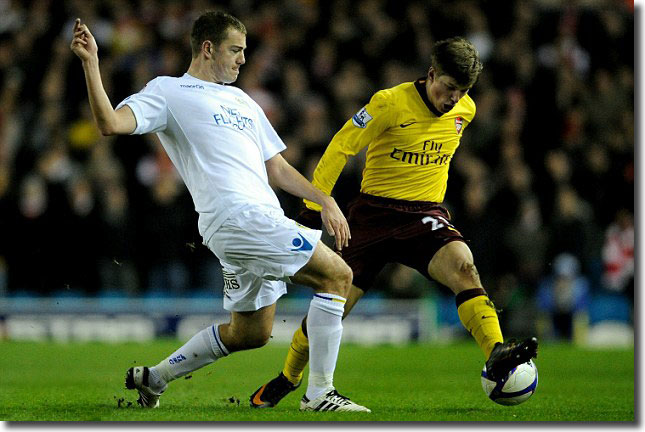 Paul Connolly ends this threat from an out of sorts Andrey Arshavin