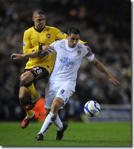 Billy Paynter made his second start at Elland Road - here he tangles with Arsenal's Kieran Gibbs