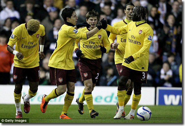 Bacary Sagna takes the Arsenal congratulations after a superb strike to make it 2-0