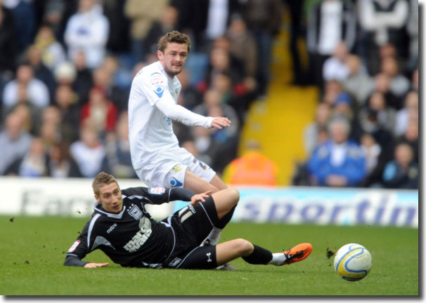 Left-back George McCartney is tackled by Ipswich's Lee Martin on 12 March - after complaining of tiredness, McCartney was given short shrift by Ken Bates and never appeared for United again