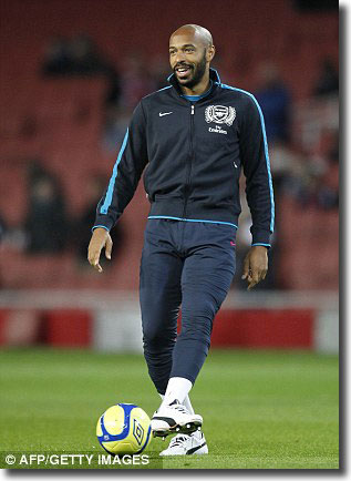 Thierry Henry warms up before the game