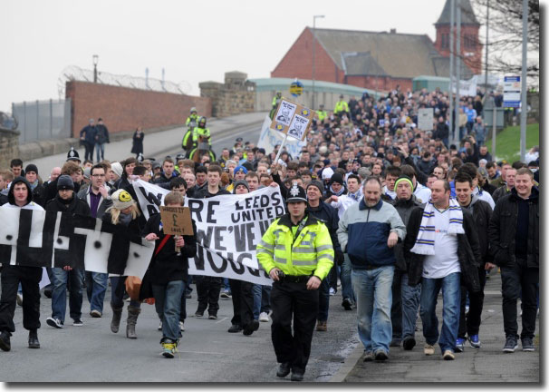 United supporters march in protest against Ken Bates before the Brighton game on 11 February