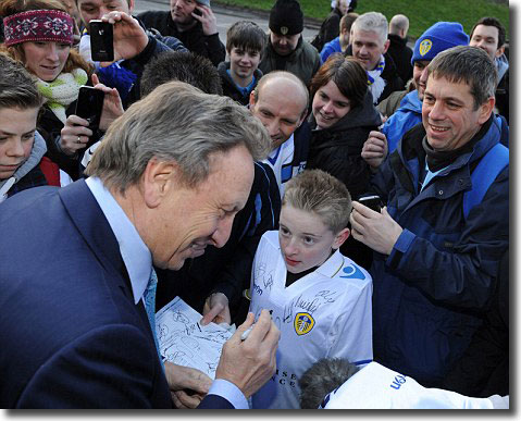 Neil Warnock signs autographs before the game with Doncaster on 18 Februar