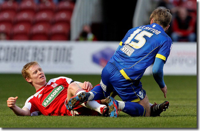 Adam Clayton tangles angrily with Middlesbrough's Barry Robson on 11 March - Robson was dismissed and Clayton given the red card