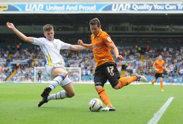 Sam Byram tackles Wolves winger Matt Jarvis during his debut