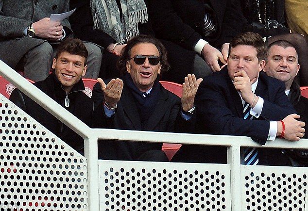 Massimo Cellino flanked by son Edoardo and David Haigh with Dominic Matteo in the background during a goalless draw at Middlesbrough 22 February 2014