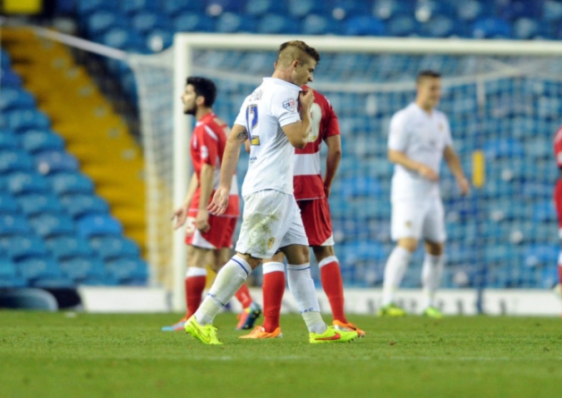 Gaetano Berardi is dismissed for a dangerous tackle against Accrington 12 August 2014
