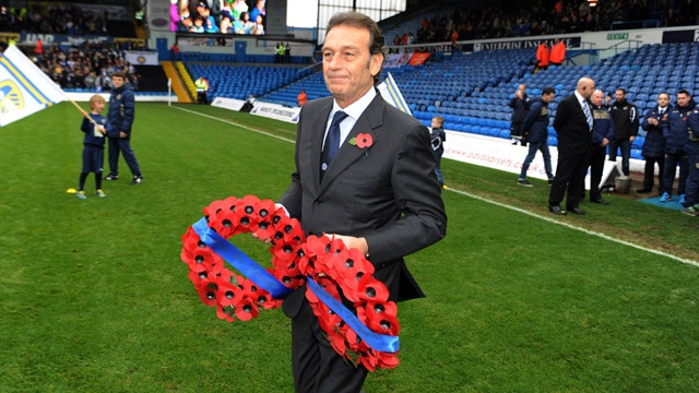 Masssimo Cellino brings on a Remembrance wreath before the game against Blackpool 8 November